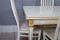 Комплект мебели для кухни стол Инфинити слоновая кость с золотой патиной и четыре стула Вегас белые, сиденье велюр бежевый